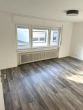 Wohnzimmer 1. OG links - Montabaur, attraktives Renditeobjekt